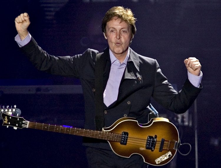 Paul McCartney performs during a concert Sunday July 20, 2008 in Quebec City. (AP Photo/The Canadian Press, Jacques Boissinot)